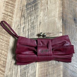 Red leather bow clutch. Jessica Simpson.